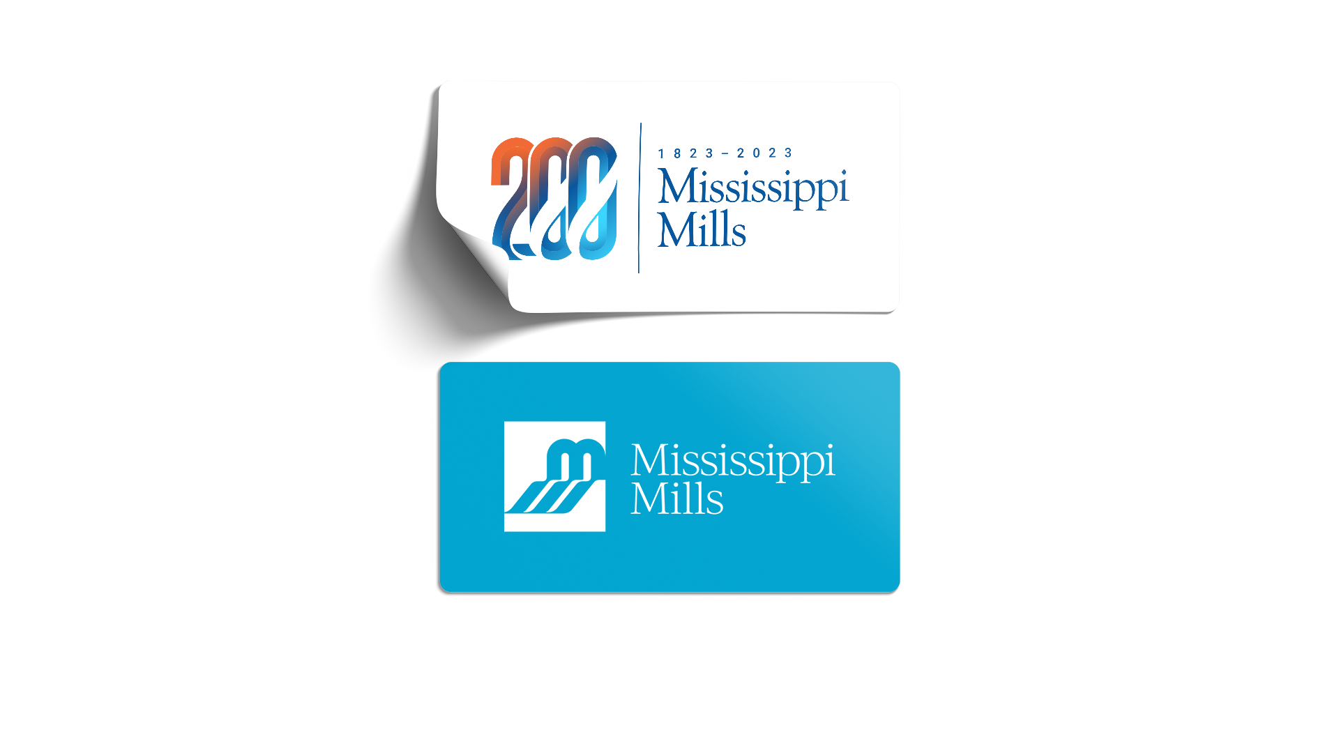 Two rectangular stickers with rounded corners: white with full-colour Bicentennial logo; blue with white Mississippi Mills logo.