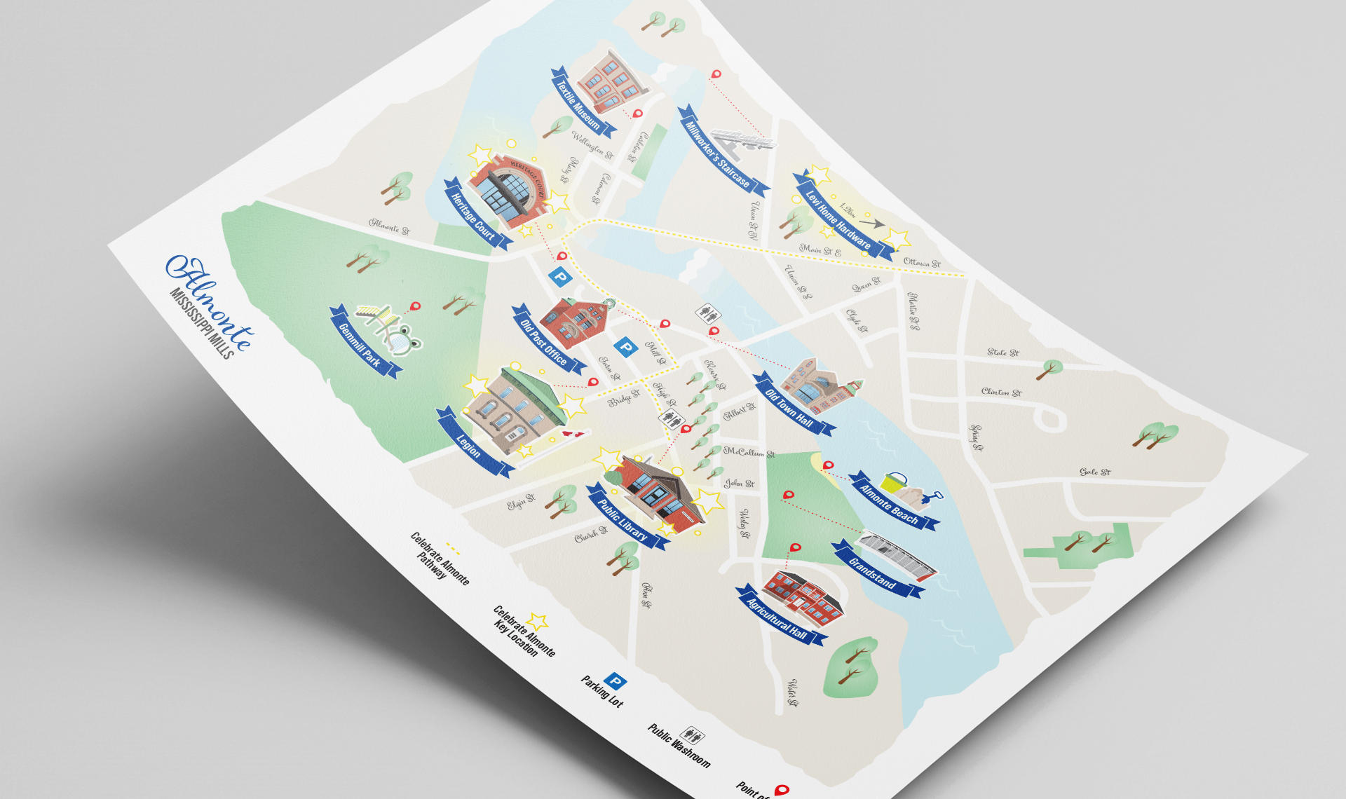 Printed Mississippi Mills map showing celebration points of interest; paper slightly lifted on the left and angled to the right.