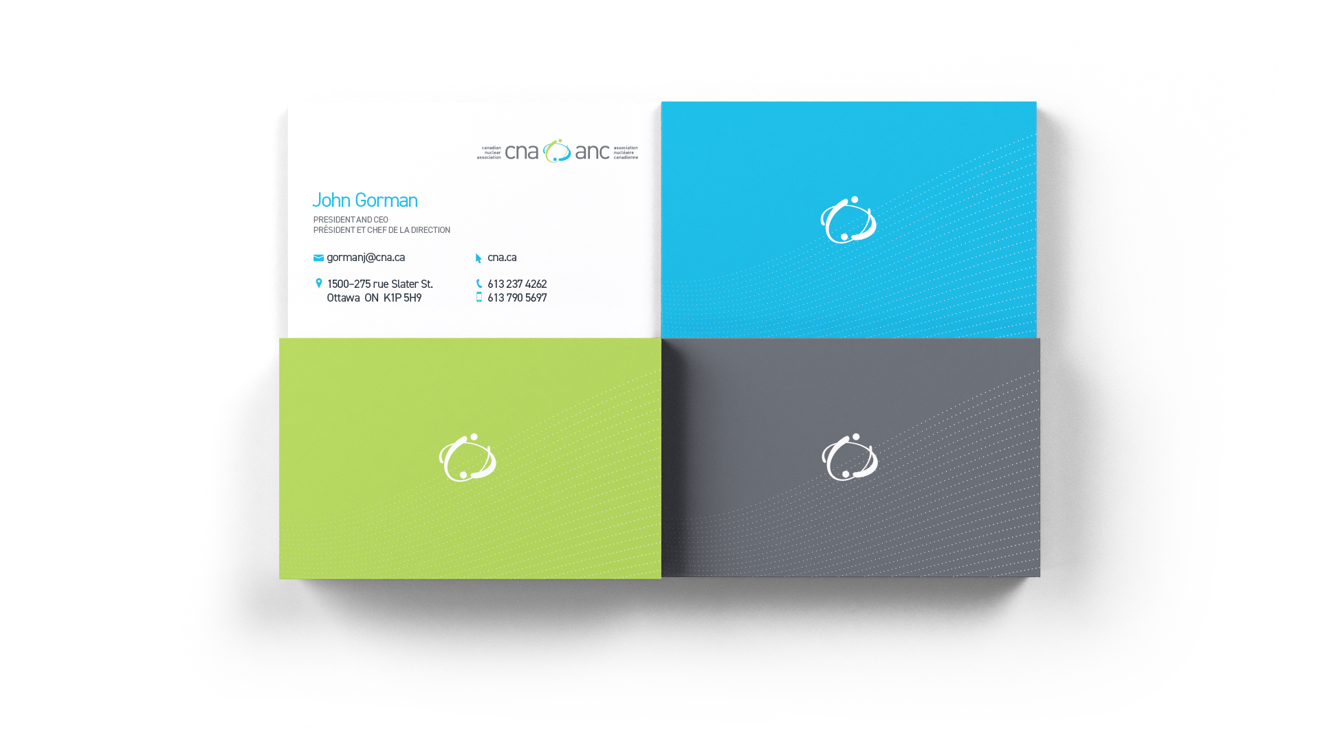 CNA business cards with grey, blue, and green backs and dotted detail; front shows logo top right and contact info bottom left.