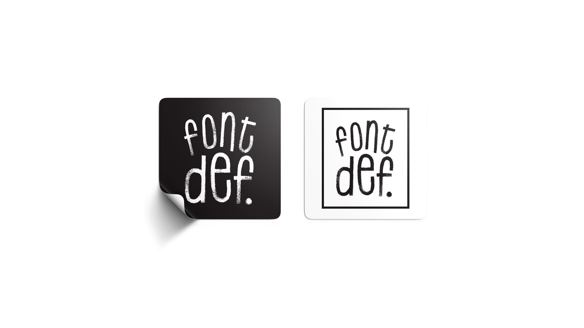 Two Font Def stickers: left sticker black, with white logo, slightly peeling; right sticker white with black logo.
