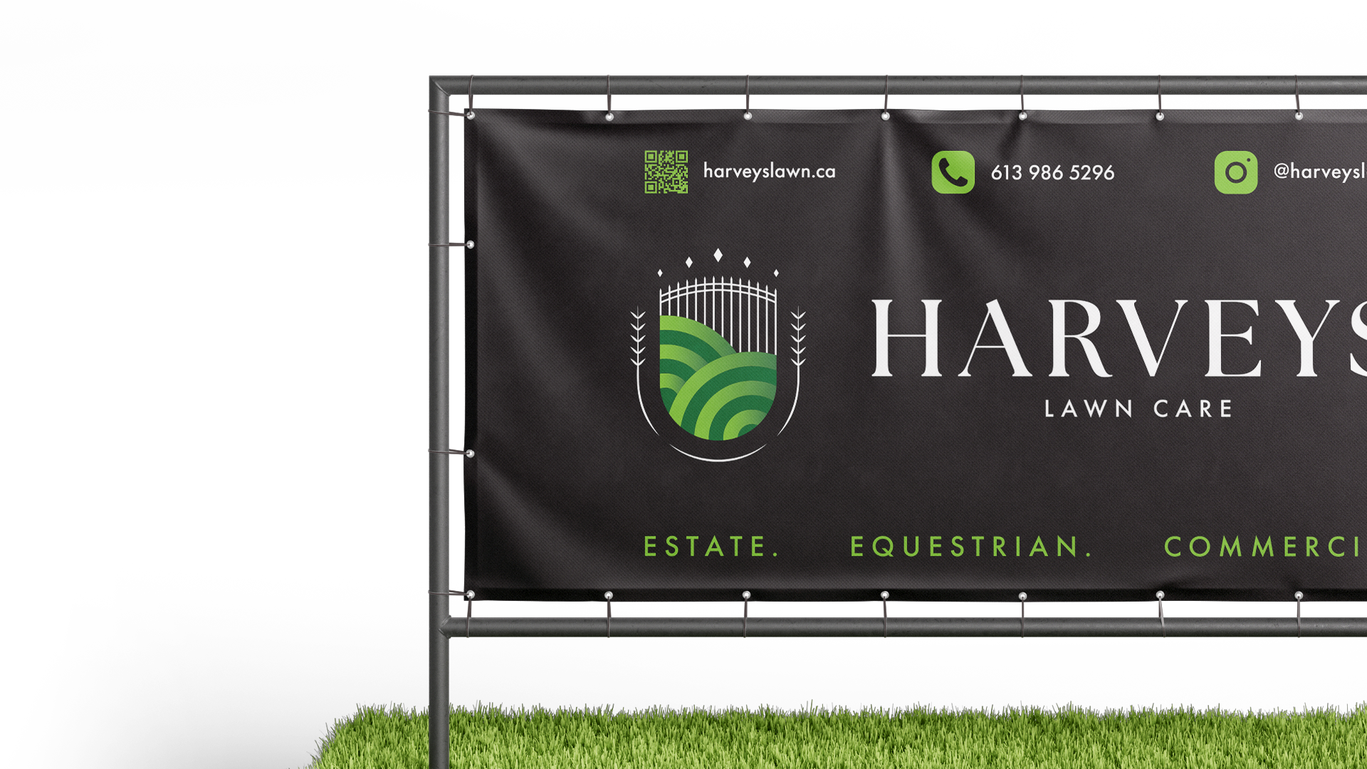 Harvey’s Lawn Care logo displayed on an outdoor sign.