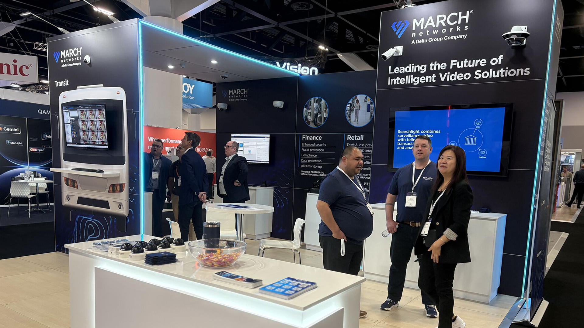 Photograph of people standing in the March Networks booth at a security expo.